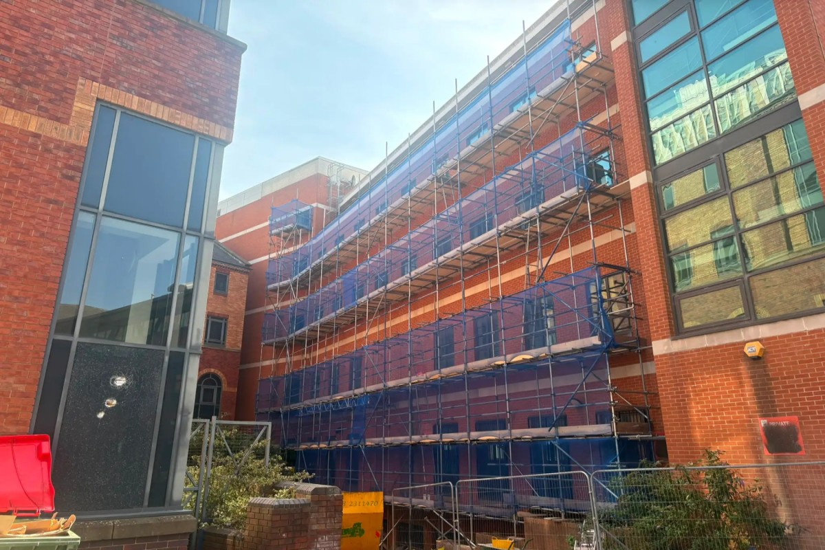Doncaster Project for Commercial-Access Scaffolding with Edge Protection, Guardrails and Integrated Ladder Access Towers and Debris Containment